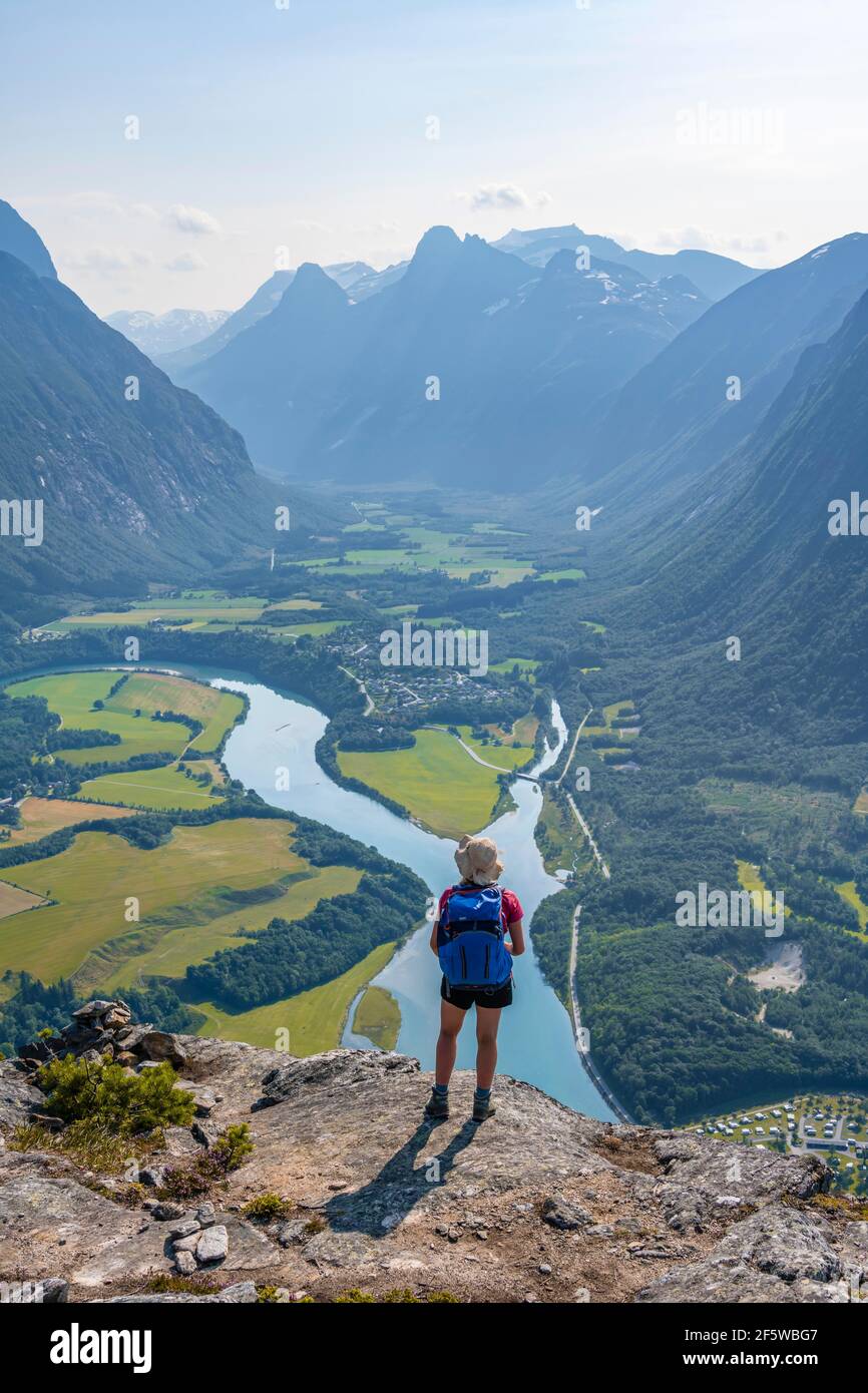 Hiker on the Romsdalseggen hike, mountain ridge, Rauma River, Romsdalfjellene Mountains, Andalsnes, More og Romsdal, Norway Stock Photo