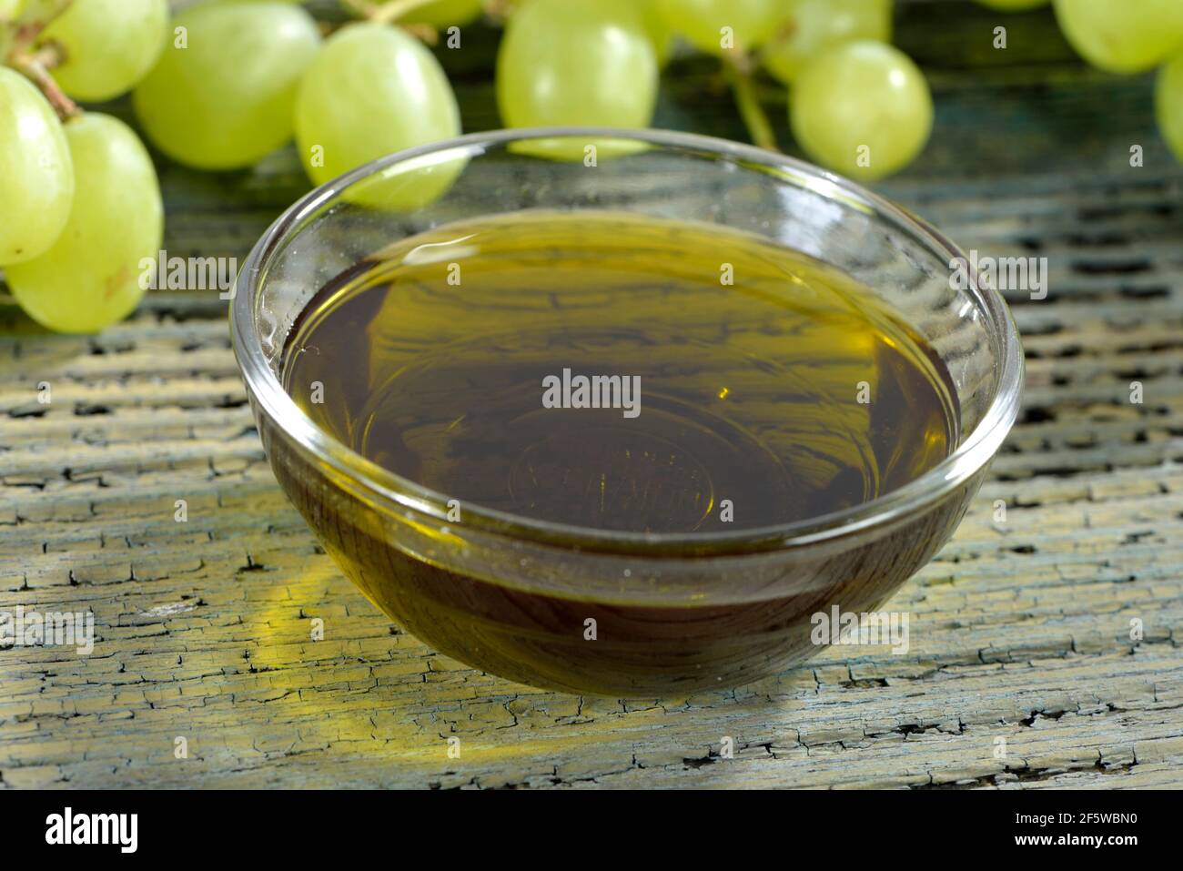 Grape seeds and grape seed oil (Vitis vinifera subsp. vinifera), grape seed oil Stock Photo Alamy