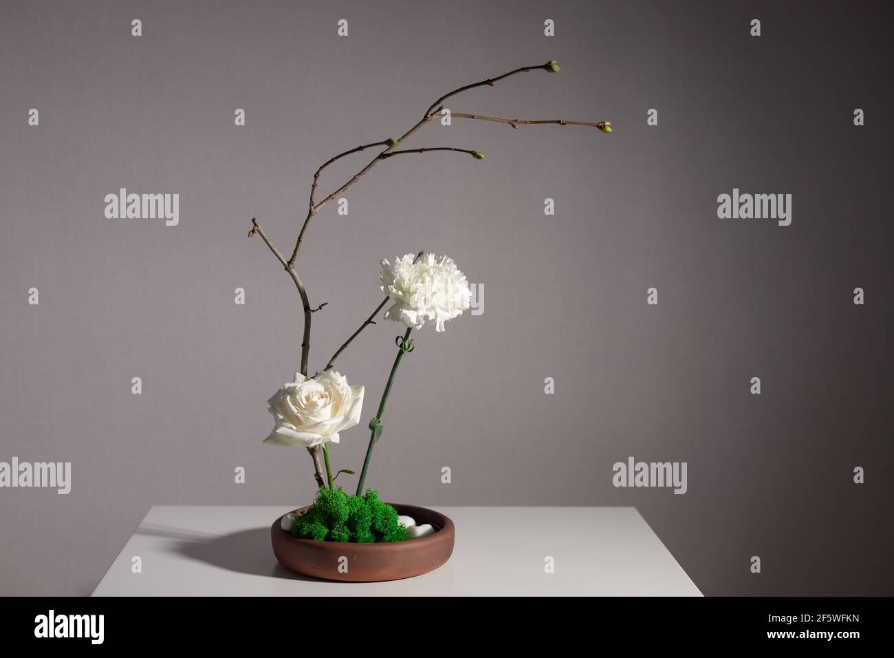 Flower arrangement of white carnation, rose Stock Photo Alamy