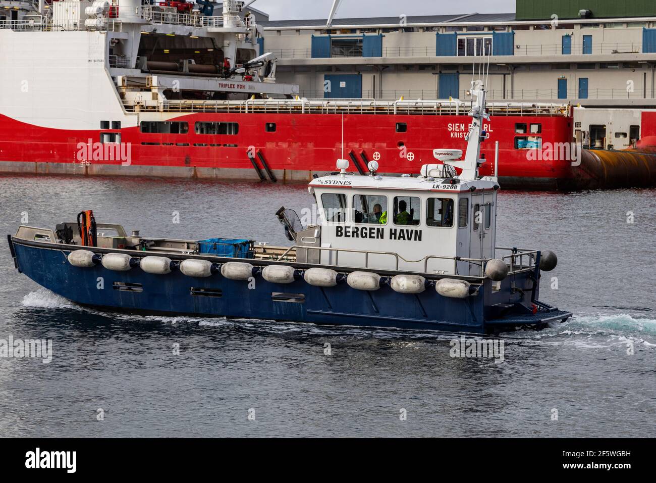 MB 'Sydnes', Bergen port authority's maintenance boat,  Outbound from  the inner port of Bergen, Norway Stock Photo