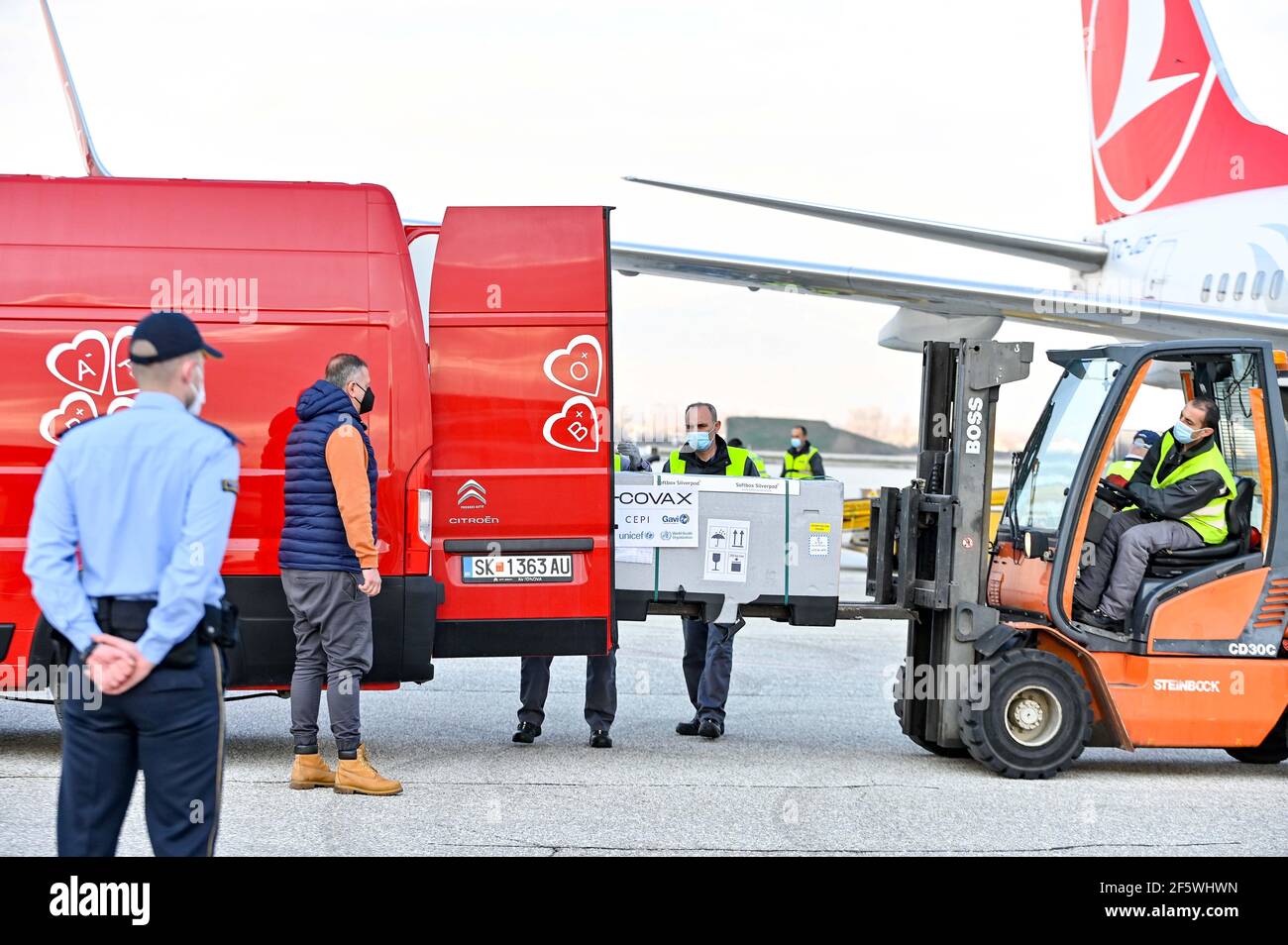 Skopje, North Macedonia. 28th Mar, 2021. Workers load North Macedonia's  first batch of AstraZeneca's COVID-19 vaccines received through the  UN-backed Covax program, at Skopje's International Airport in Skopje, North  Macedonia, March 28,