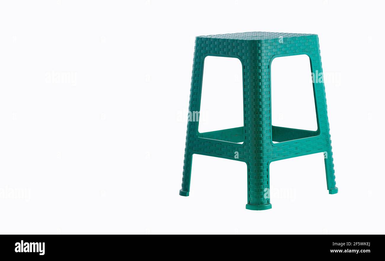 Green plastic stool isolated on white background Stock Photo - Alamy