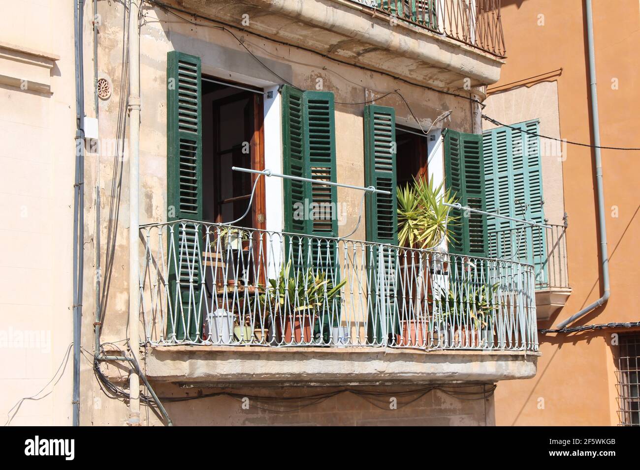 Typical Mallorcan balcony and shutters in Palma de Mallorca Stock Photo
