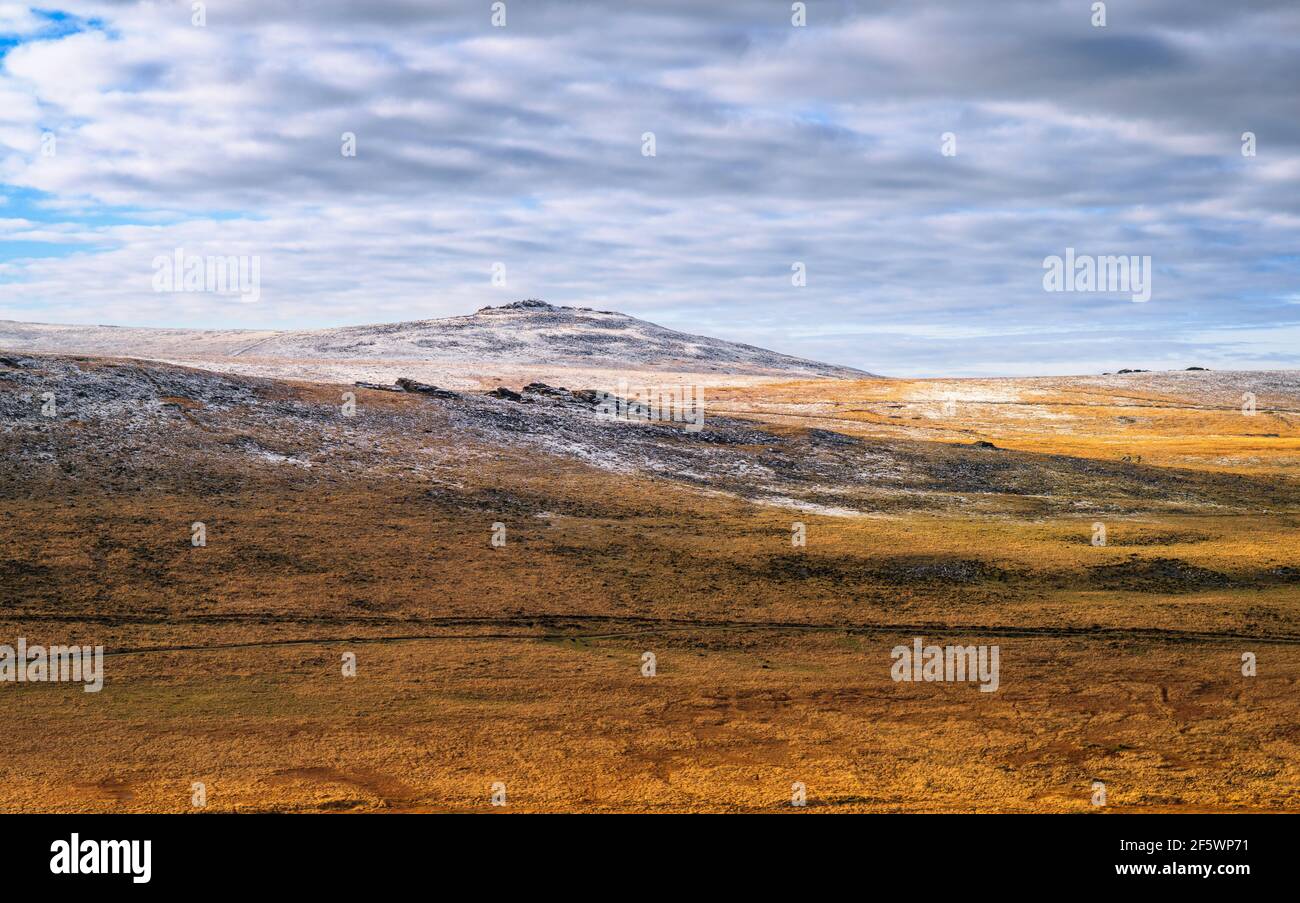 View of Yes Tor with light winter snowfall, Dartmoor National Park, Devon, England, UK. Stock Photo