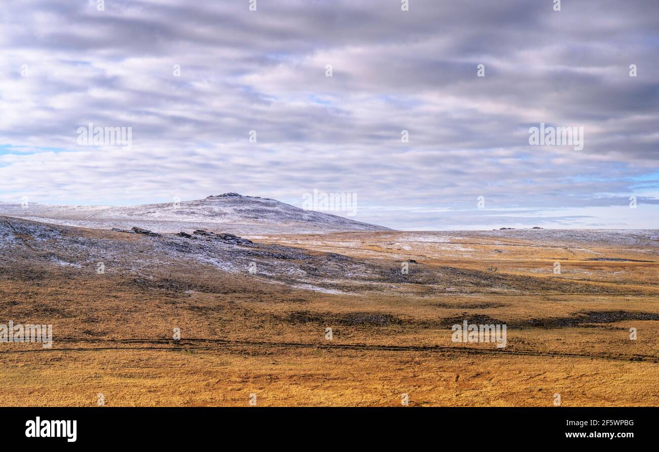 View of Yes Tor with light winter snowfall, Dartmoor National Park, Devon, England, UK. Stock Photo