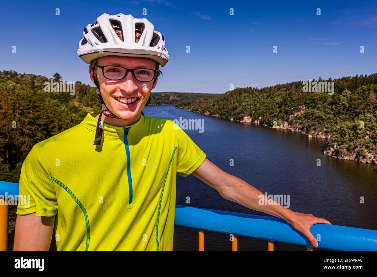 Julius Berg on a Vltava bridge. Long stretches of the bank are in their original state and most of the cycle paths lead over the hilly hinterland Stock Photo