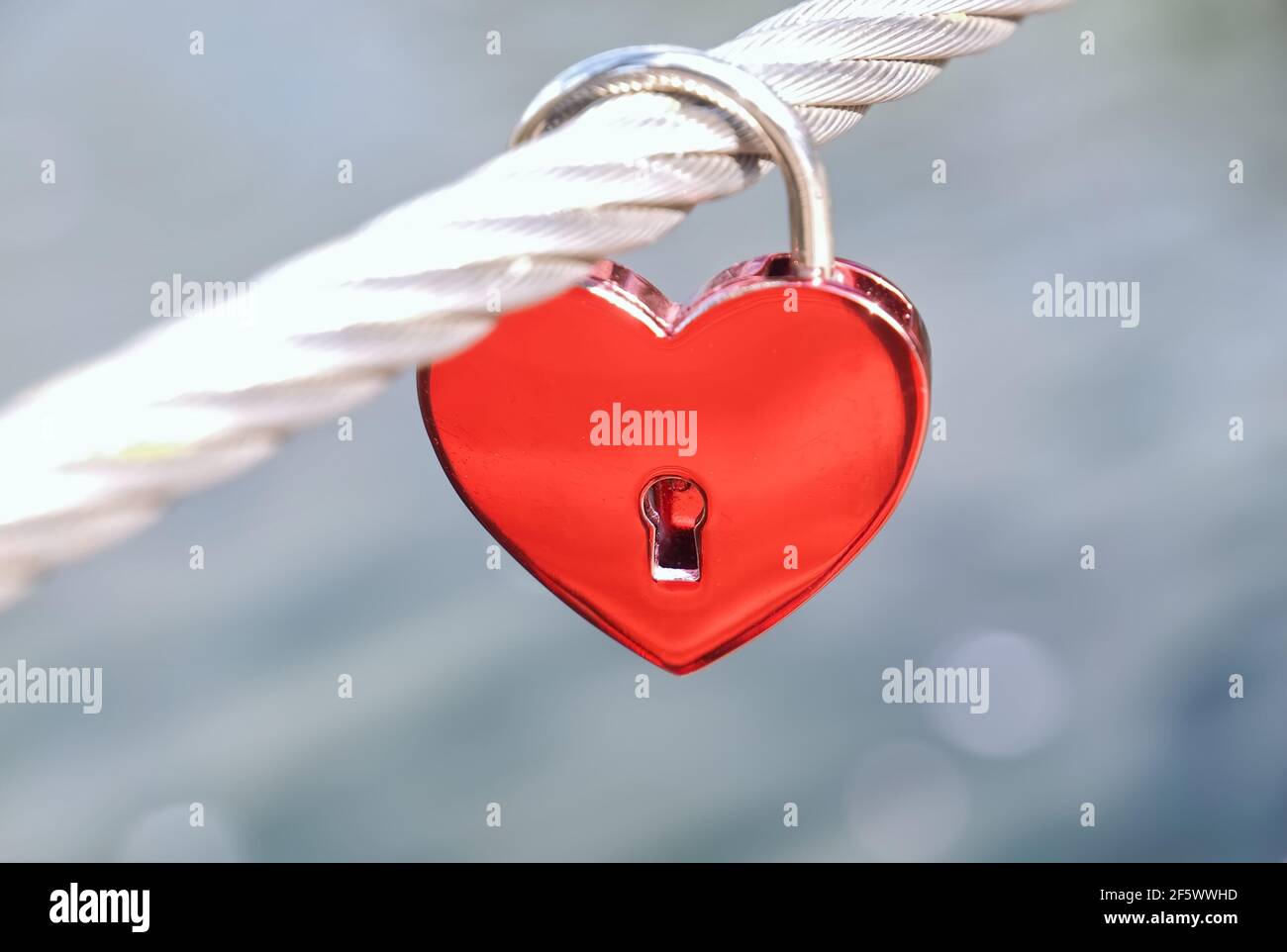 Red love lock at a fence in form of a heart Stock Photo - Alamy