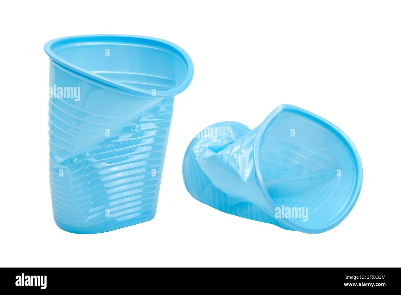 Crushed, damaged, discarded blue empty plastic cups, objects isolated