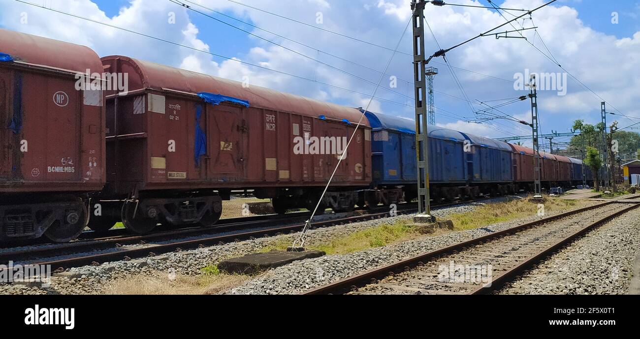 Cargo Containers Transportation On Freight Train By Railway. Intermodal