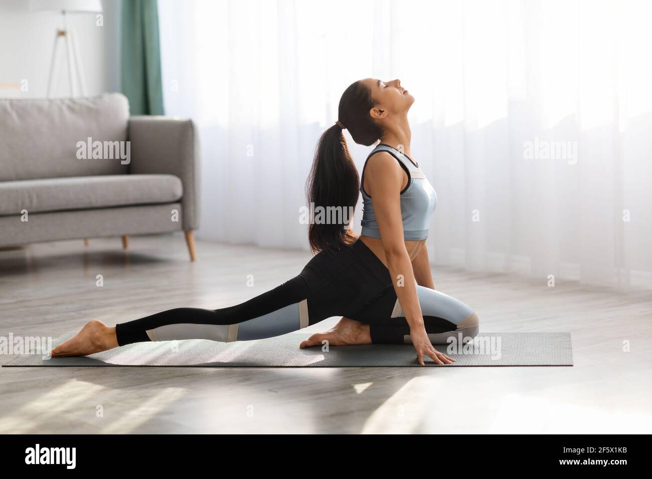 Slim pretty woman stretching hi-res stock photography and images - Alamy