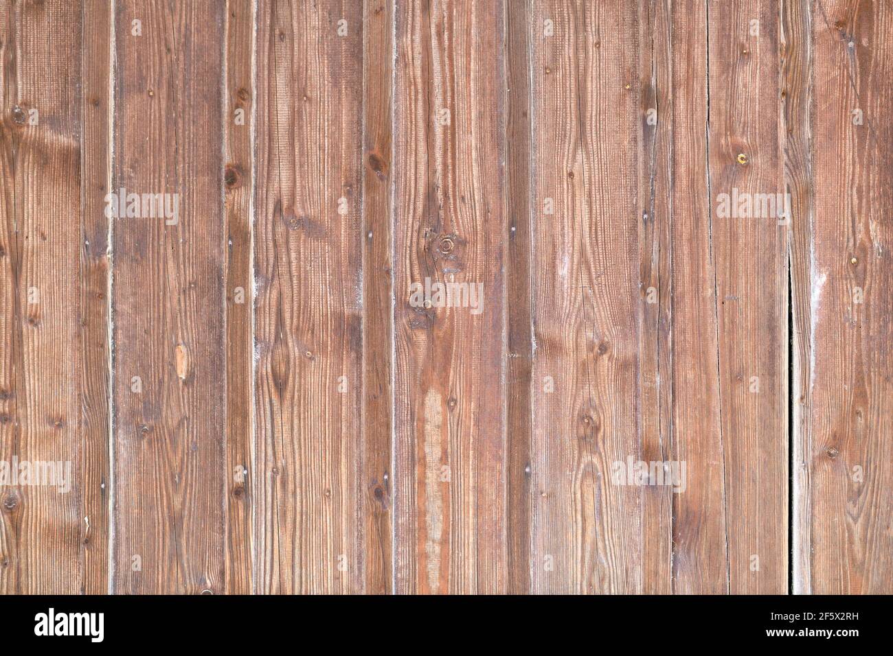 Wooden background with brown colored planks Stock Photo