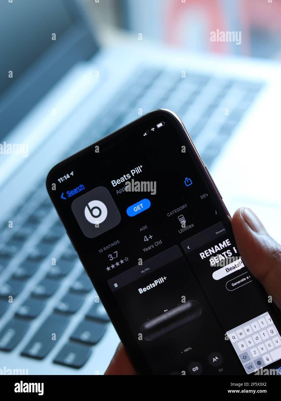Beats Pill logo on phone screen stock 