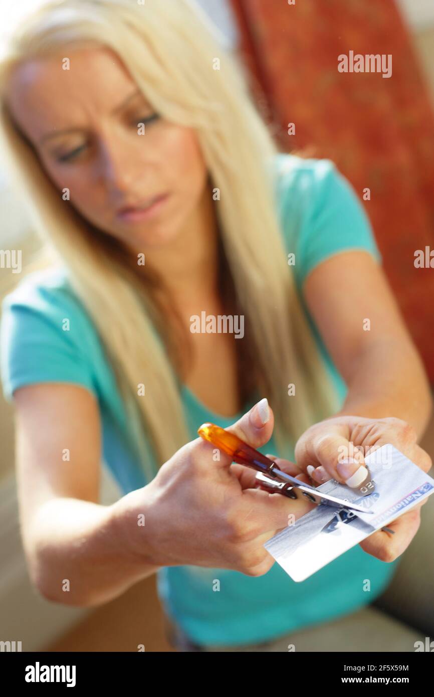 Credit card cut in half hires stock photography and images Alamy