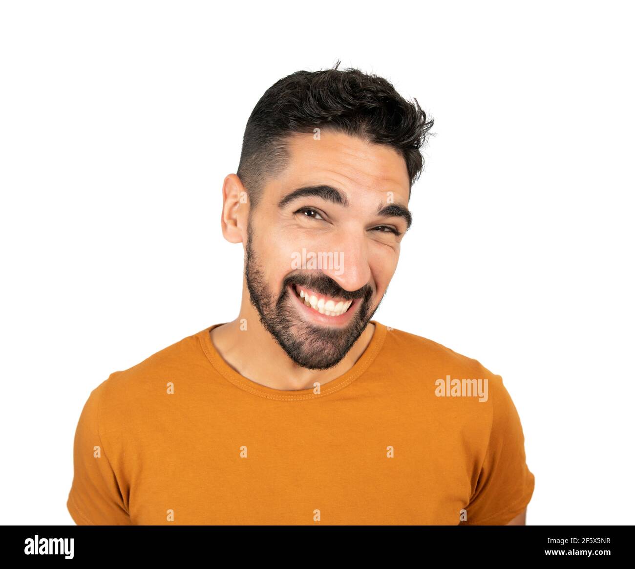 Young man smiling against white background Stock Photo - Alamy
