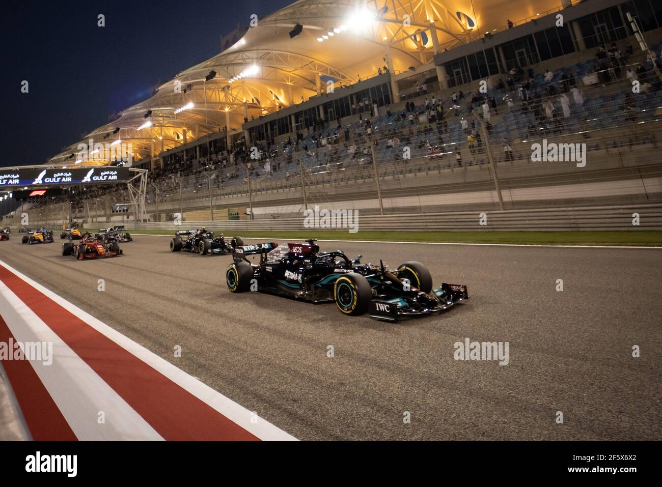 Sakhir, Bahrain. 28th Mar, 2021. Lewis Hamilton (GBR) Mercedes AMG F1 W12 at the start of the race. Bahrain Grand Prix, Sunday 28th March 2021. Sakhir, Bahrain. Credit: James Moy/Alamy Live News Stock Photo