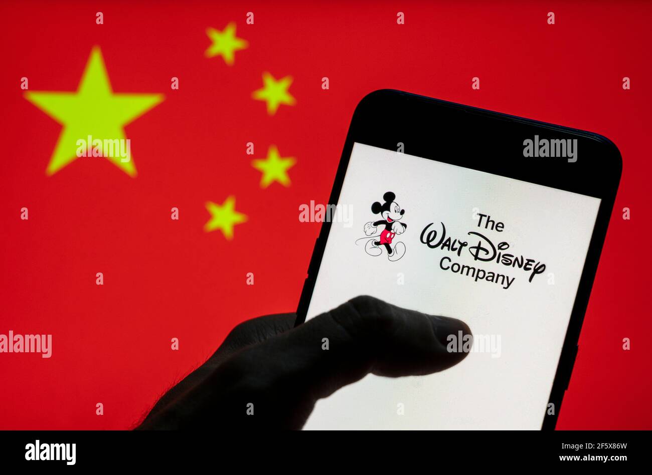 In This Photo Illustration The American Multinational Mass Media And Entertainment The Walt Disney Company Or Also Called Disney Logo Seen On An Android Mobile Device With People S Republic Of China Flag