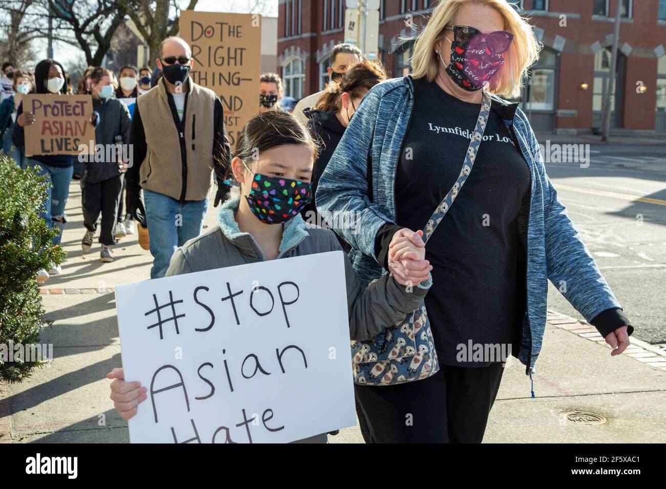 March 27, 2021. Beverly, MA. Citizens gathered to rally and march ...