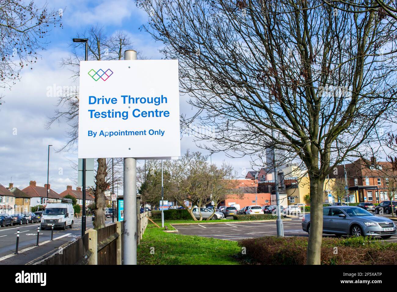 ISLEWORTH, LONDON, ENGLAND- 17th February 2021: Drive Through Testing Centre sign at West Middlesex University Hospital in Isleworth Stock Photo