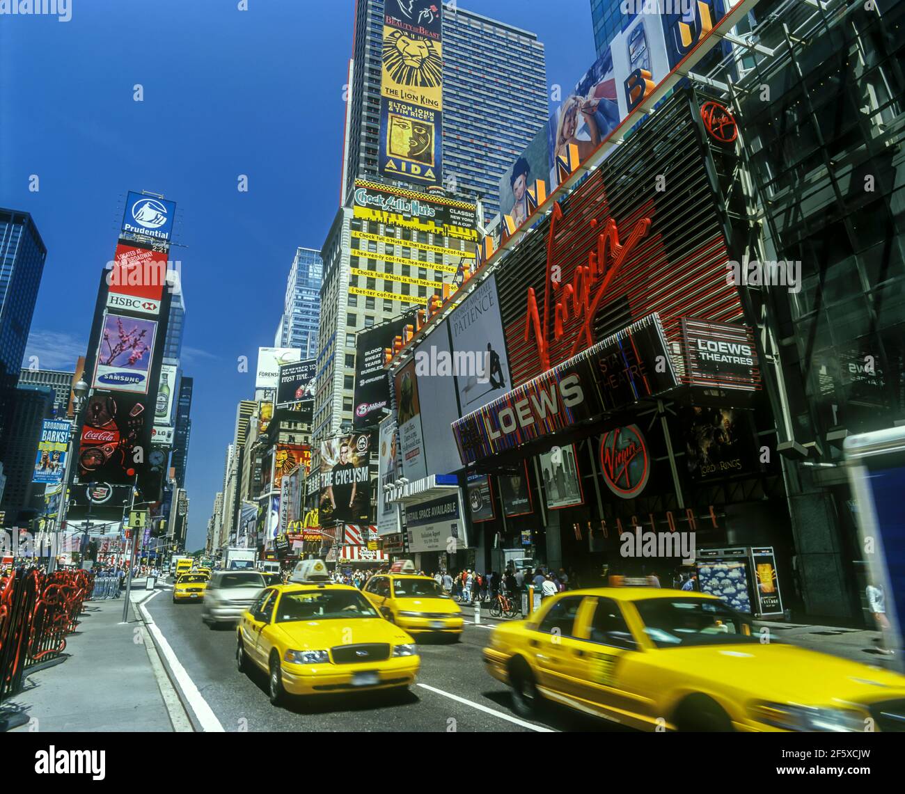 2004 HISTORICAL YELLOW TAXI CABS (©FORD MOTOR CO 2000) TIMES SQUARE MANHATTAN NEW YORK CITY USA Stock Photo
