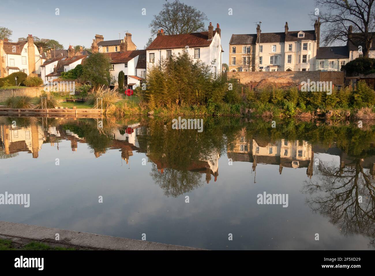 River Cam with reflections showing riverside houses in Cambridge Stock Photo