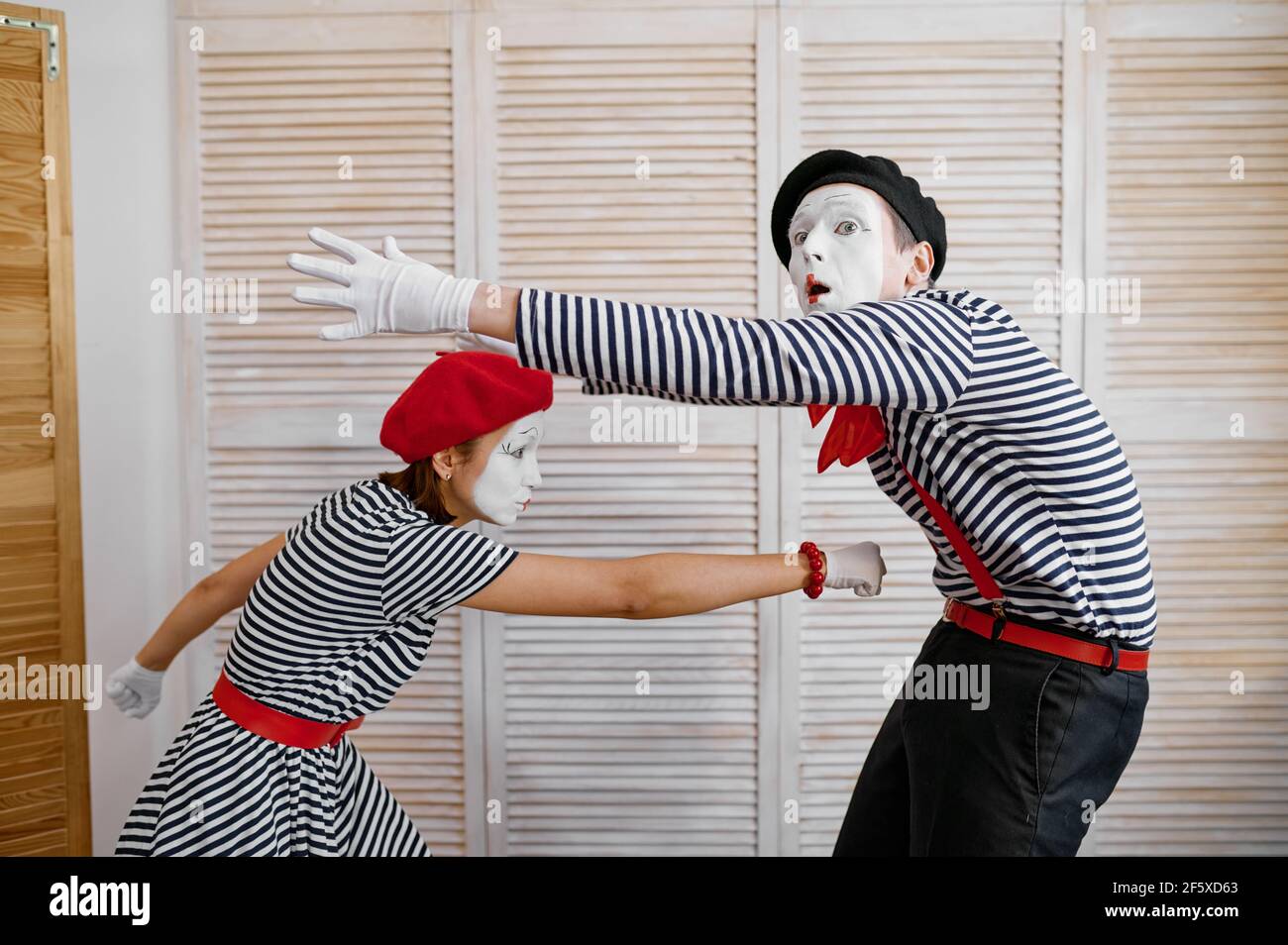 Two clowns, mime artists, boxing parody, comedy Stock Photo