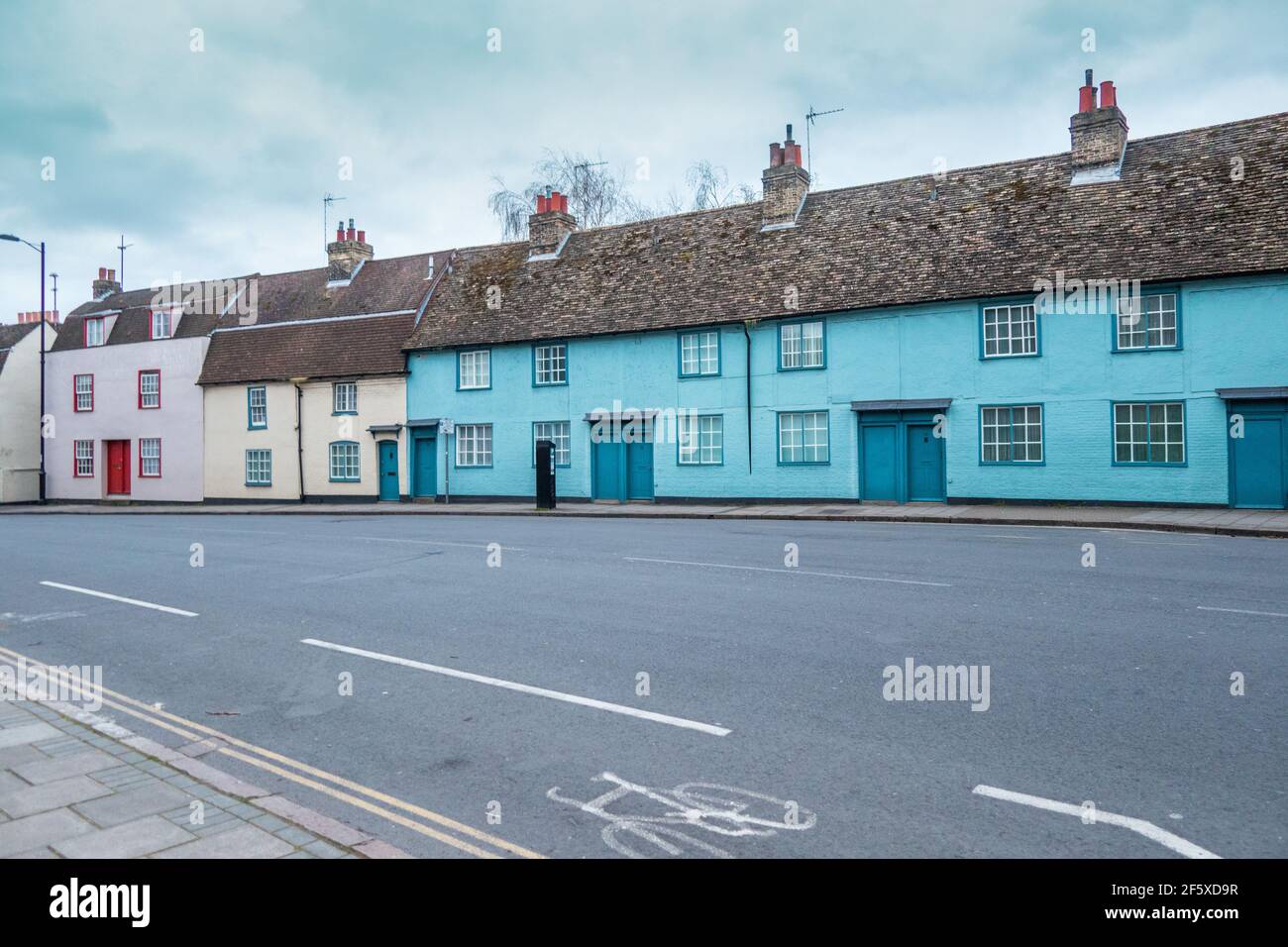 Row of coloured old cottages in Northampton Street Cambridge England Stock Photo