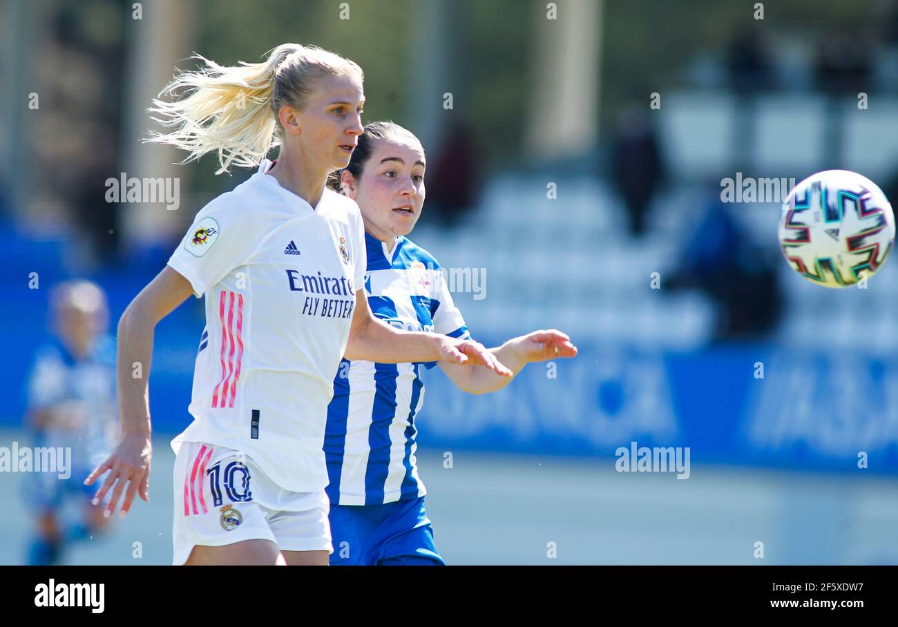 Iris Arnaiz of Deportivo Abanca competes for the ball with Sofia Jakobsson of Real Madrid during the women's first division Iberdrola league Stock Photo