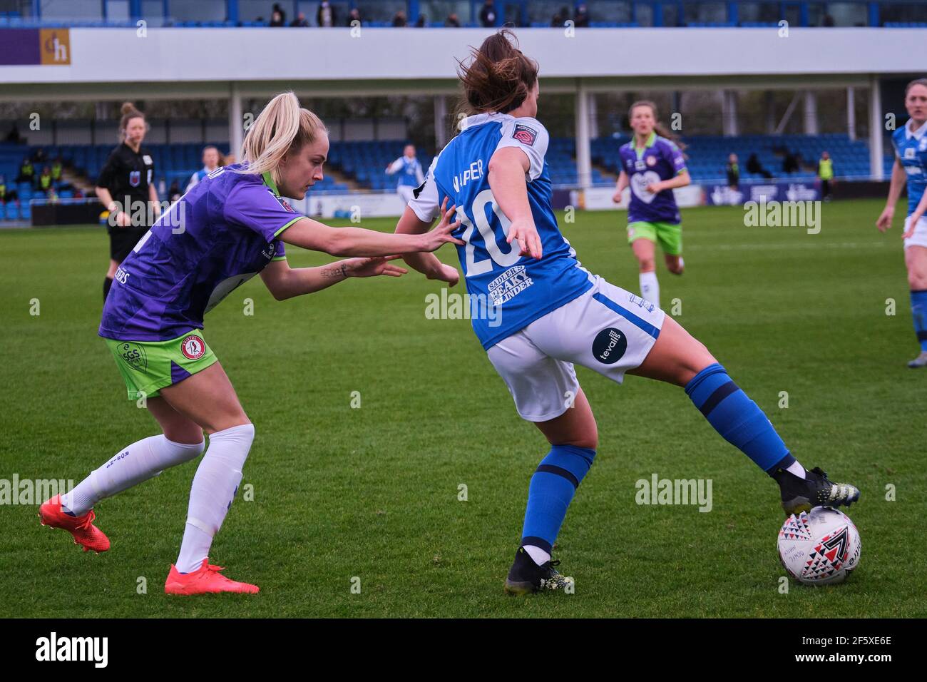 Solihull, UK. 28th Mar, 2021. Jamie-Lee Napier (#20 Birmingham City) and Faye Bryson (#2 Bristol City) battle for the ball during the FA Women's Super League match between Birmingham City and Bristol City at SportNation.bet Stadium in Solihull, England. Credit: SPP Sport Press Photo. /Alamy Live News Stock Photo