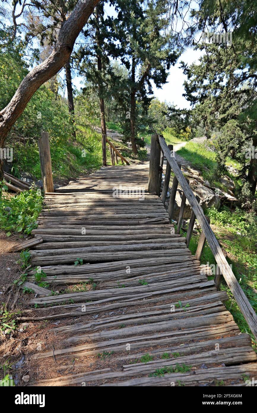 Wooden bridge in the park of Filopappou Hill, near Akropolis, in Athens city, Greece, Europe Stock Photo