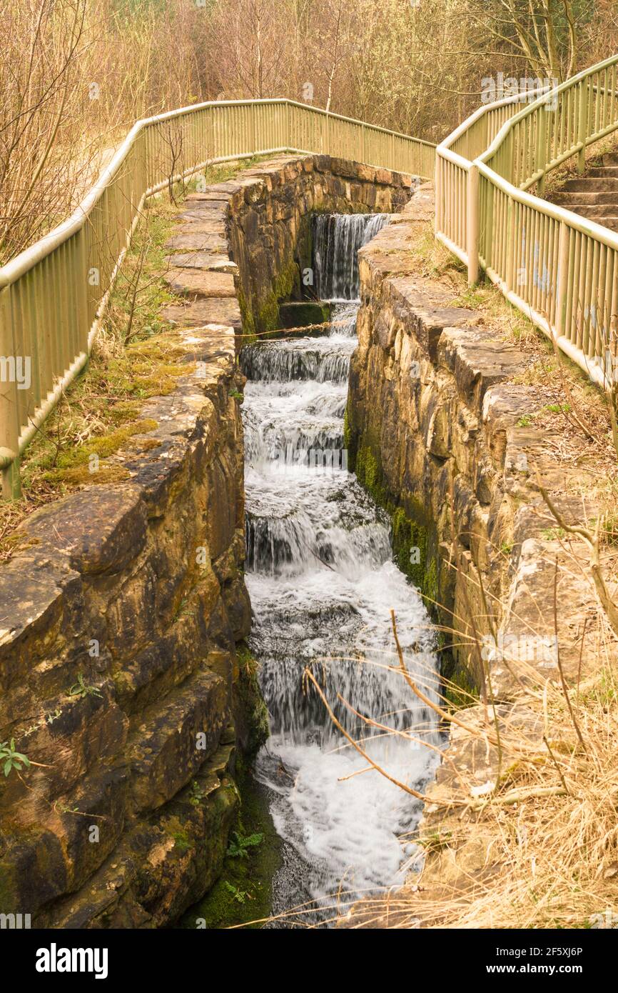 The spillway from the lake in Watergate Forest Park, Gateshead, north