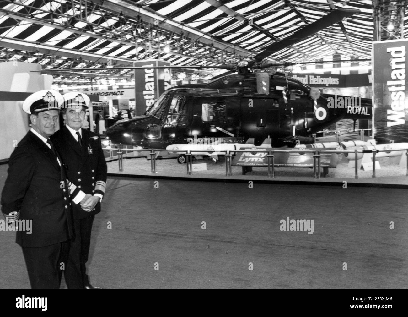 CAPT. OF HMS EXCELLENT J.J. STREATFIELD - JAMES (LEFT) AND VICE ADMIRAL SIR  LINSAY BRYSON CONTROLLER OF THE NAVY AT THE ROYAL NAVY EQUIPOMENT  EXHIBITION AT HMS EXCELLENT, PORTSMOUTH. PIC MIKE WALKER ,