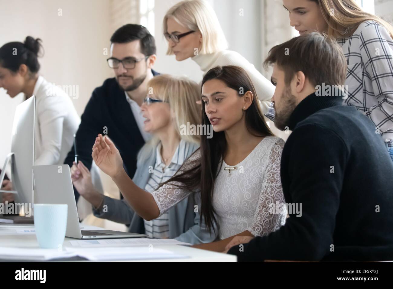 Multiracial colleagues work together collaborate at office meeting ...