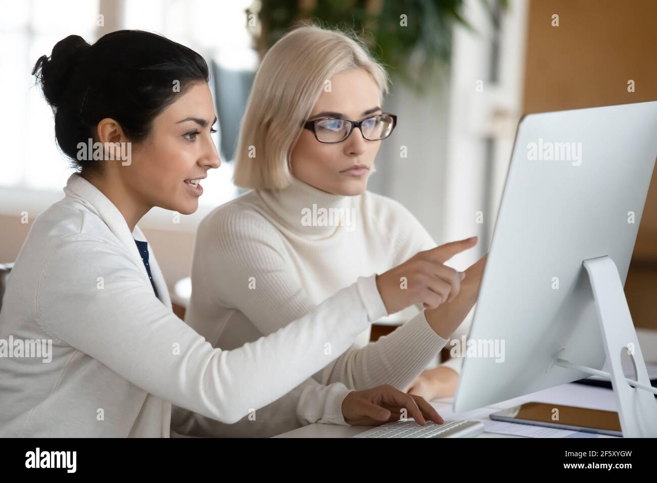Pc multiracial hi-res stock photography and images - Alamy