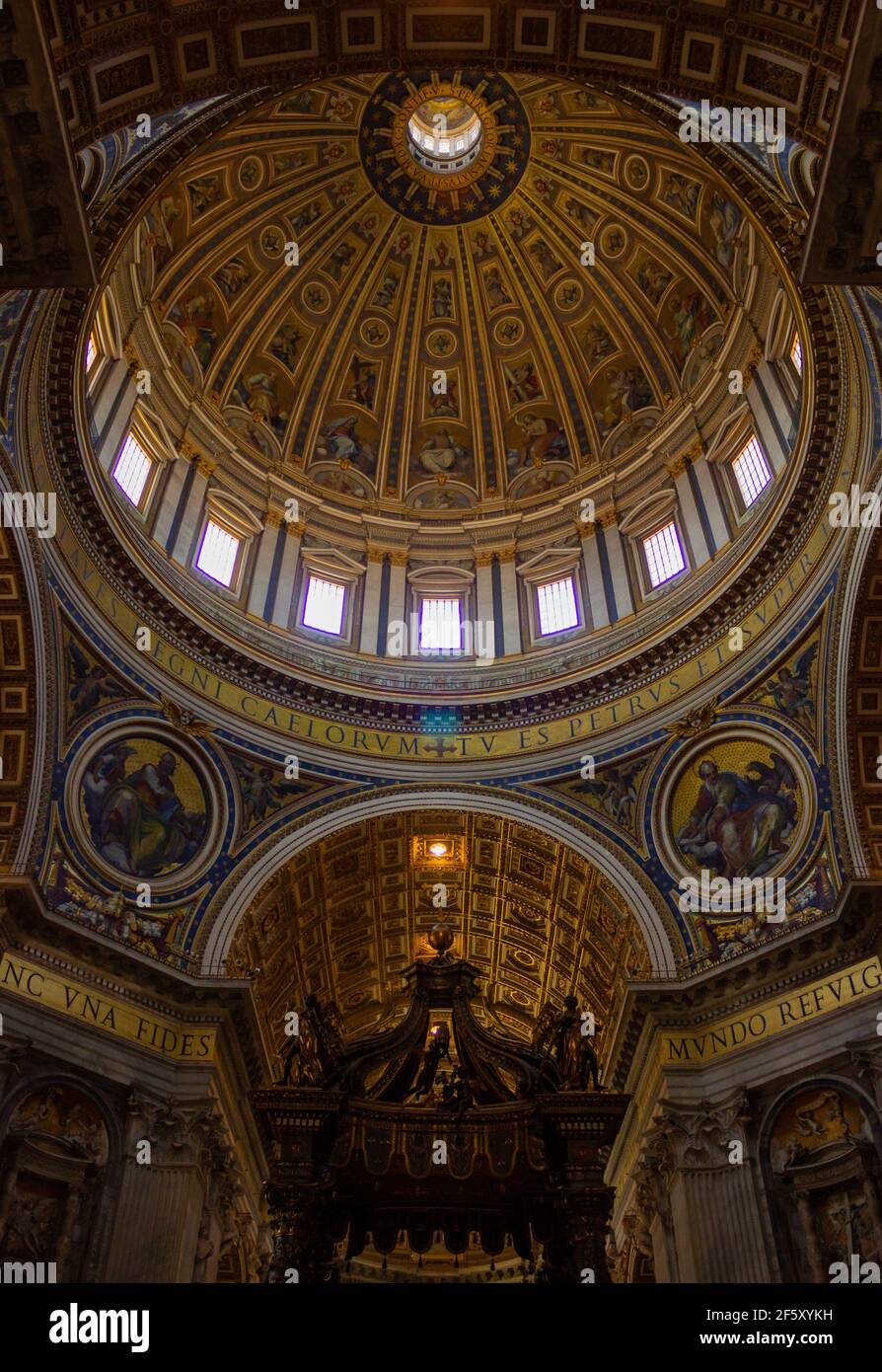 A picture of the interior of the St. Peter's Basilica and its iconic dome. Stock Photo