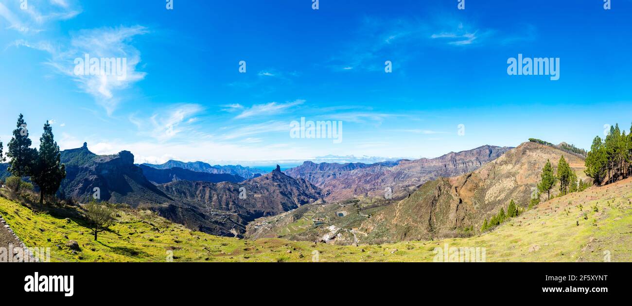 Panorama from Mirador de Degollada Becerra Gran Canaria, spain, on the left side Roque Nublo, in the middle Roque Bentayga, in the background Teneriff Stock Photo