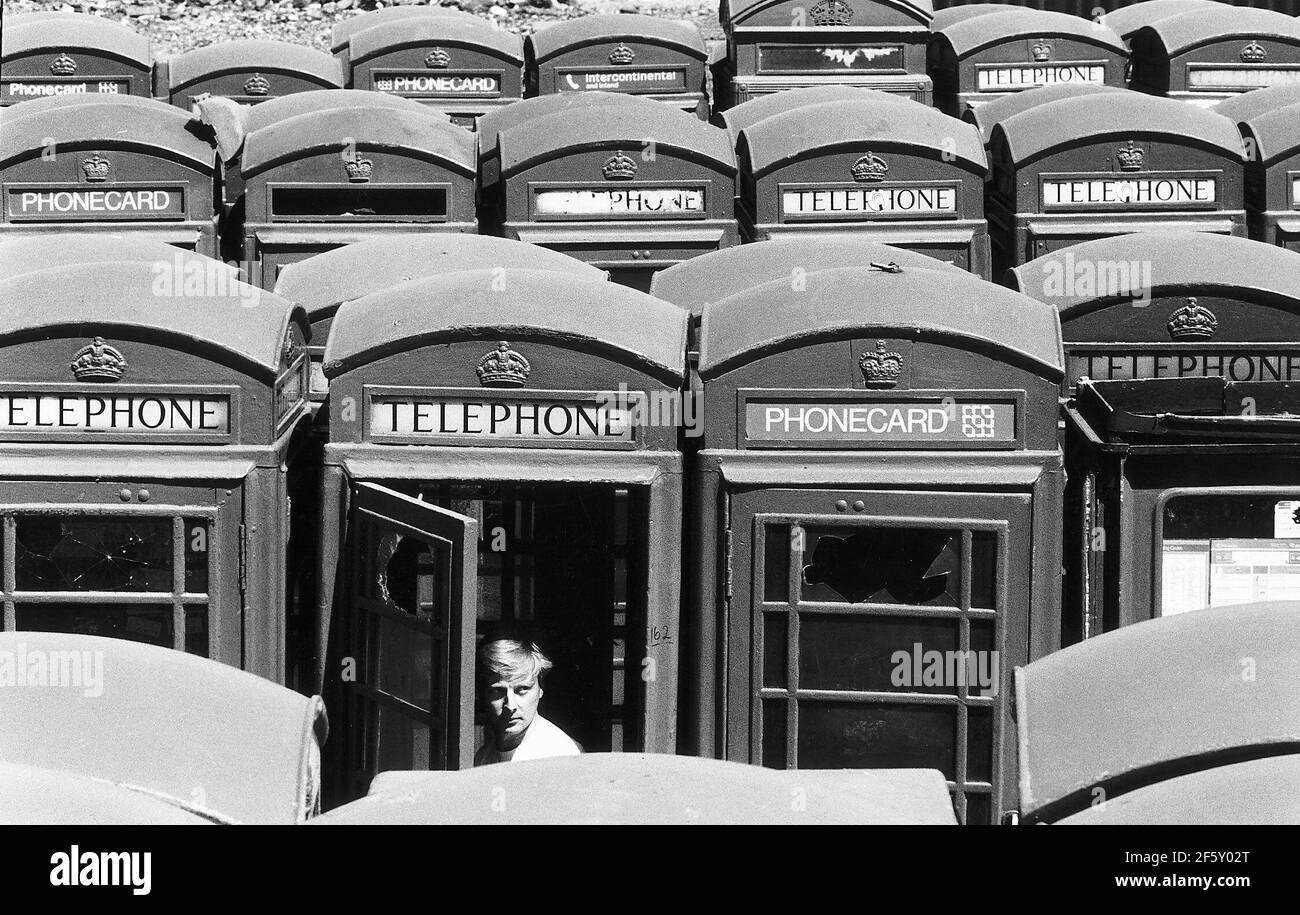 GPO Red Telephone Boxesgathered together at an industrial site in Rainham Essex where they are to be put up for auctioned. Stock Photo
