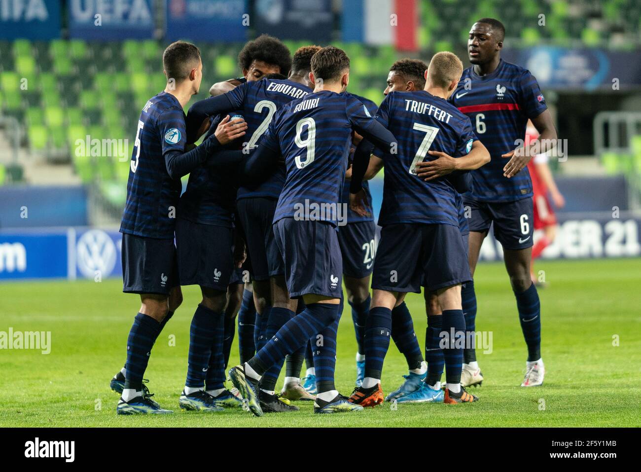 Szombathely, Hungary. 28th Mar, 2021. Odsonne Edouard (22) of France scores for 0-1 from the penalty spot and celebrates witht the team during the UEFA EURO U-21 match between Russia and France at Haladas Stadium in Szombathely. (Photo Credit: Gonzales Photo/Alamy Live News Stock Photo