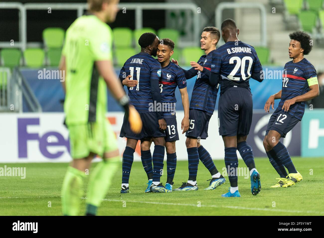 Szombathely, Hungary. 28th Mar, 2021. Jonathan Ikon (11) of France scores for 0-2 from the penalty spot ande celebrates with the team during the UEFA EURO U-21 match between Russia and France at Haladas Stadium in Szombathely. (Photo Credit: Gonzales Photo/Alamy Live News Stock Photo
