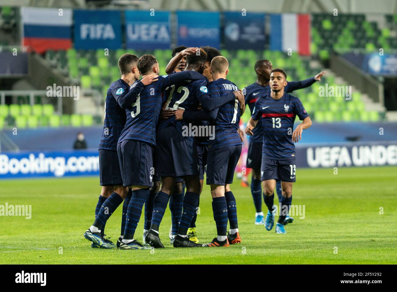 Szombathely, Hungary. 28th Mar, 2021. Odsonne Edouard (22) of France scores for 0-1 from the penalty spot and celebrates witht the team during the UEFA EURO U-21 match between Russia and France at Haladas Stadium in Szombathely. (Photo Credit: Gonzales Photo/Alamy Live News Stock Photo