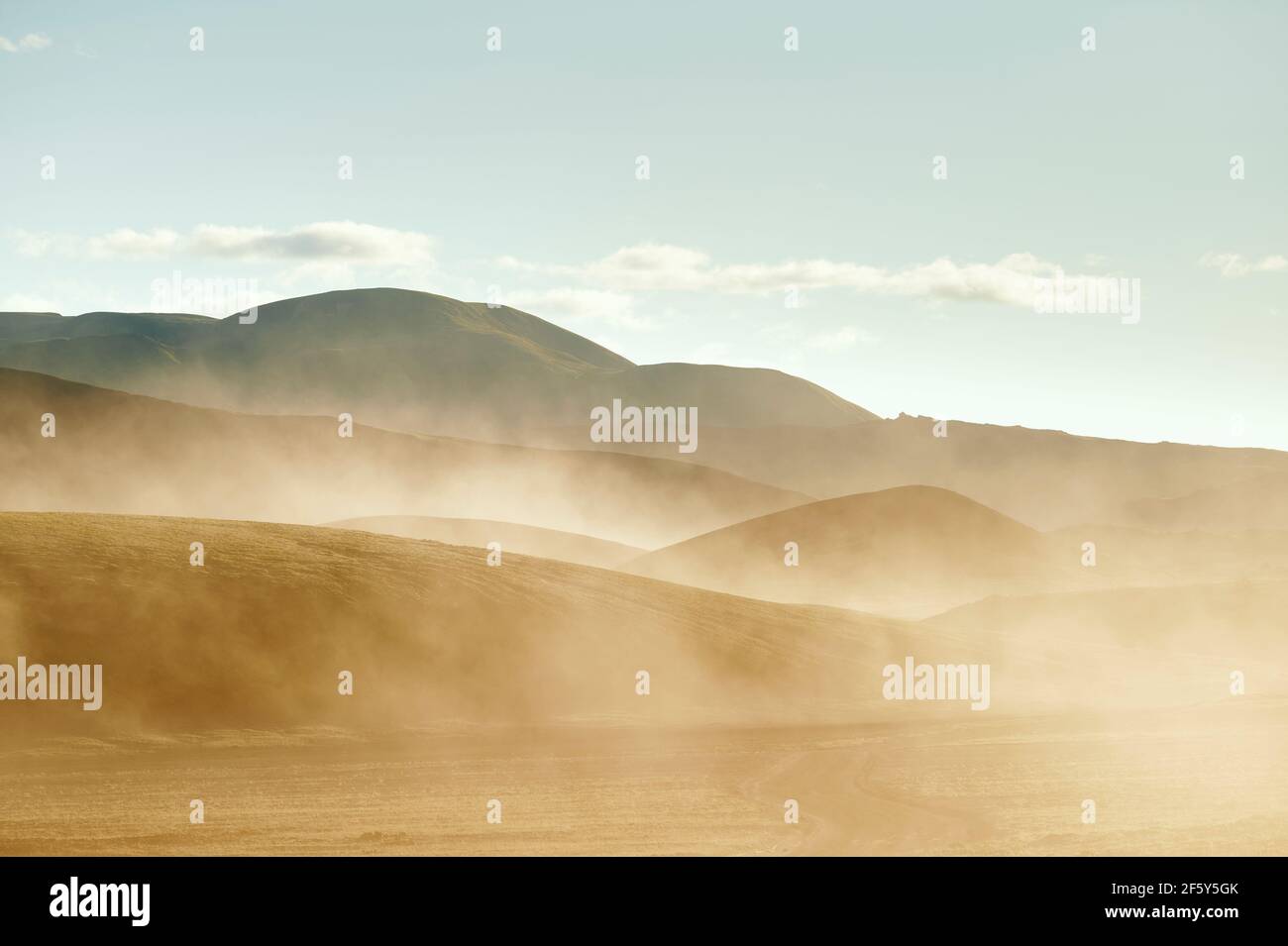 Dust storm in hilly terrain Stock Photo