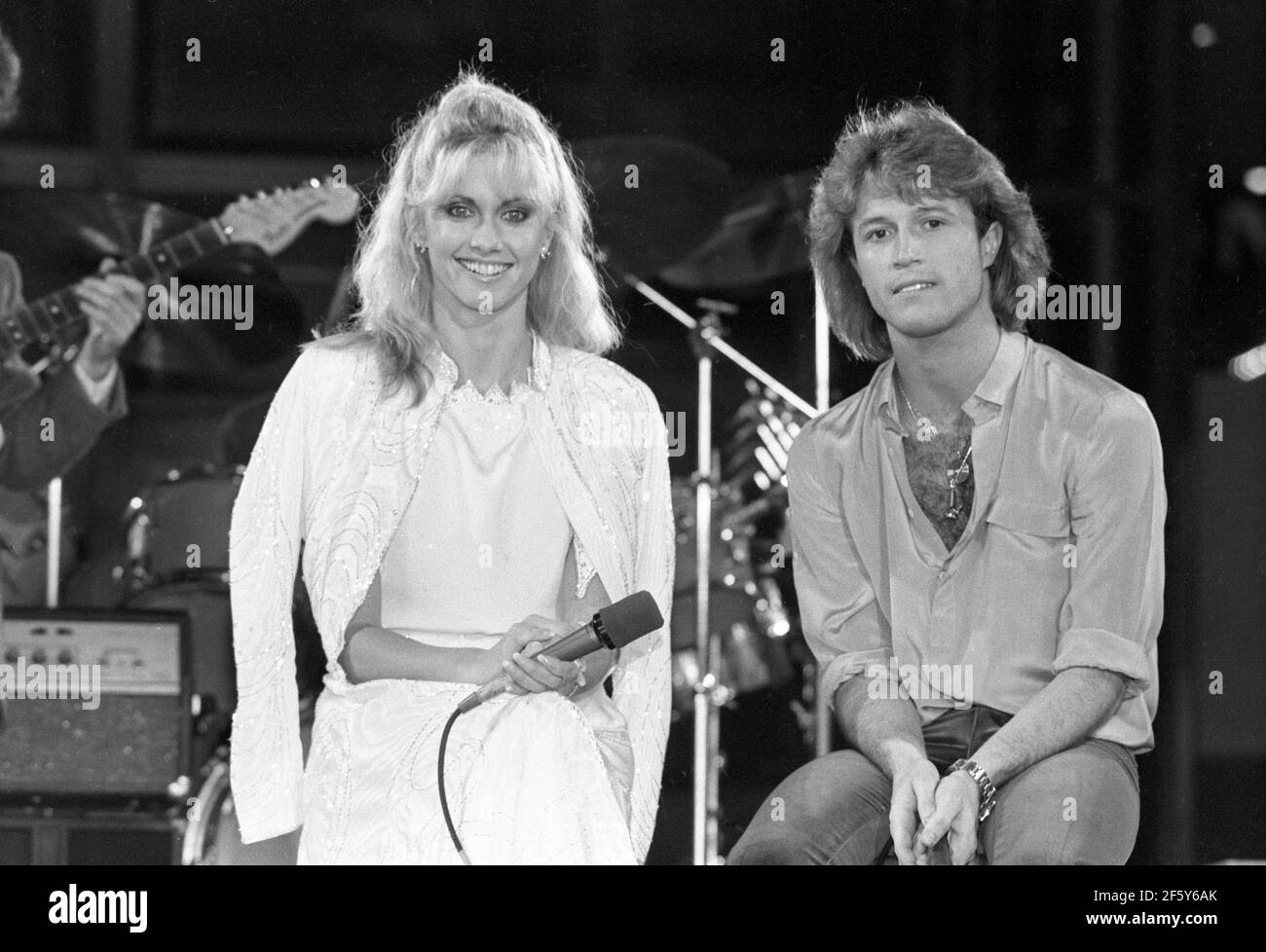 Olivia Newton-John and Andy Gibb on stage on March 19, 1980. Credit: Ralph Dominguez/MediaPunch Stock Photo