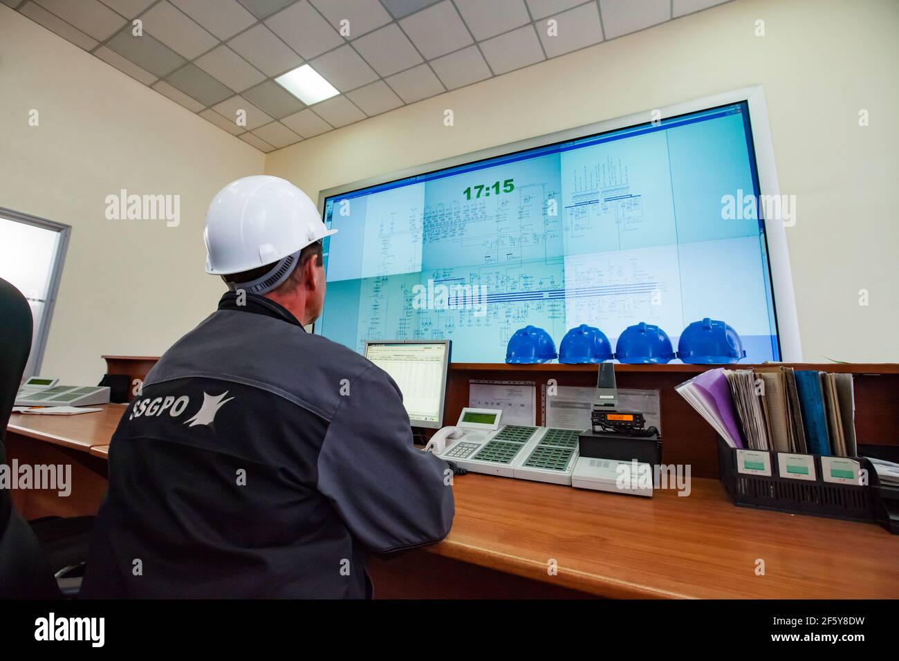 Rudny, Kostanay region, Kazakhstan-May 28 2012: Sokolovo-Sarbay Mining and processing plant. Operator engineer in automation and control room. Stock Photo