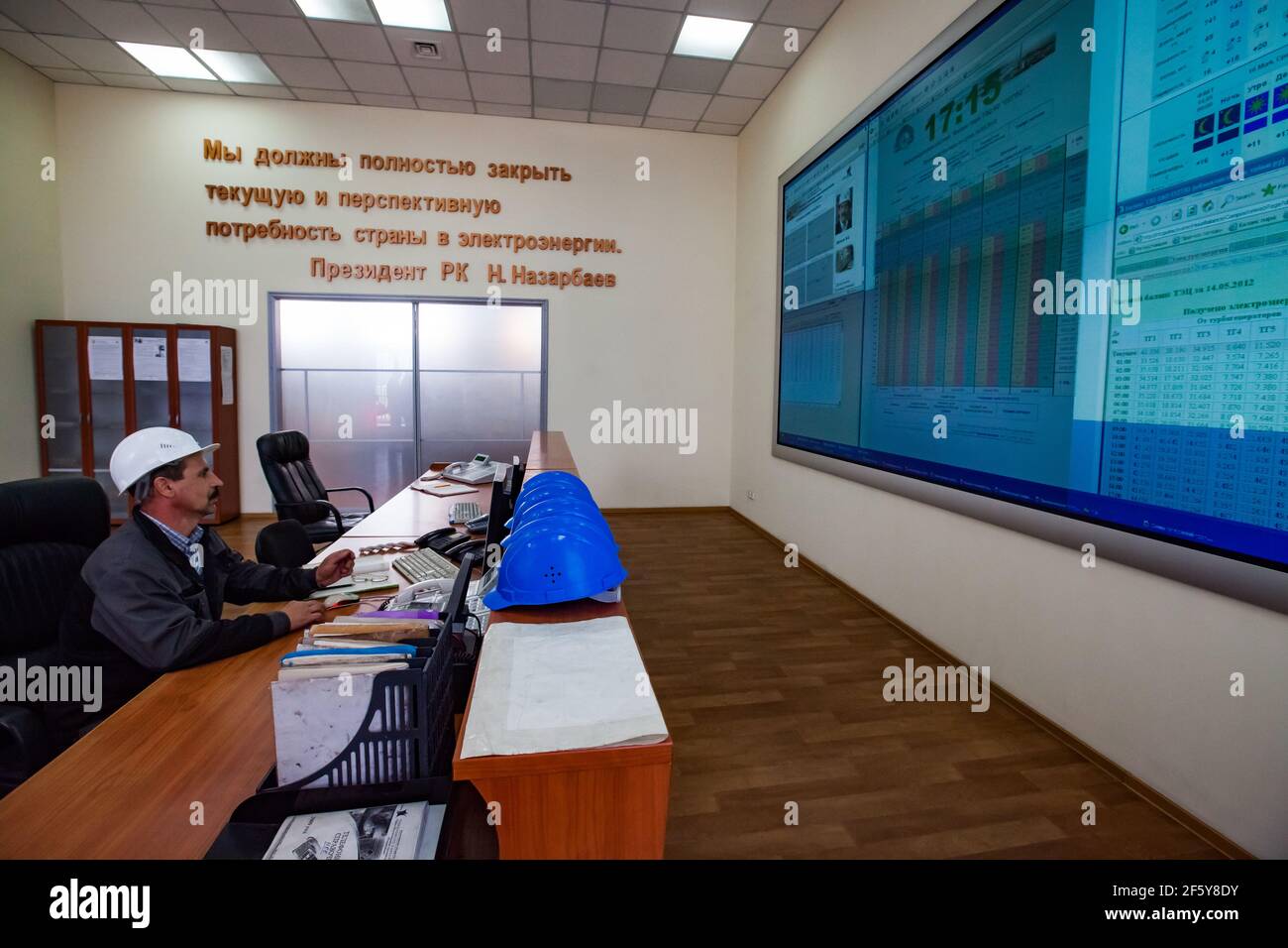 Rudny, Kostanay region, Kazakhstan-May 28 2012: Sokolovo-Sarbay Mining and processing plant. Operator engineer in automation and control room., Stock Photo