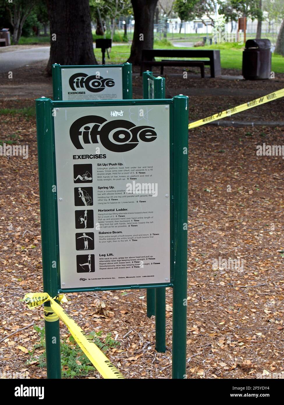 fitcore, exercise area sealed off with yellow caution tape due to covid 19 pandemic in Cann Park in Union City, California, Stock Photo