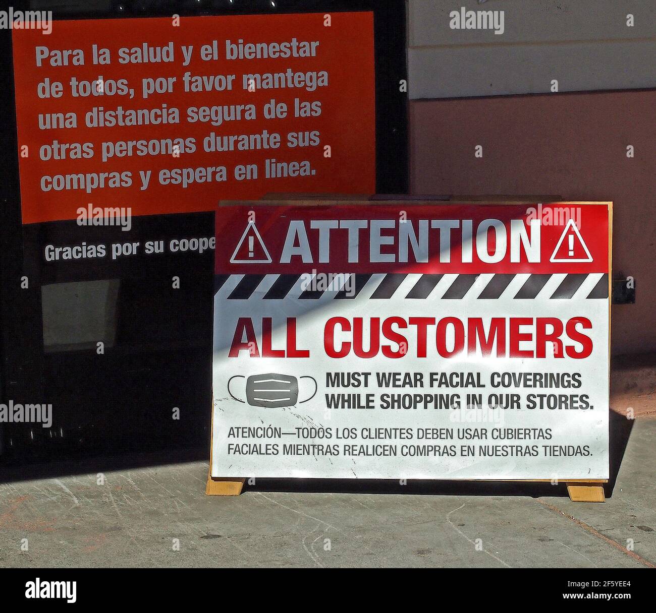 Attention all customers must wear facial coverings while shopping in our store sign at entrance to the Home Depot store in Union City, California, Stock Photo