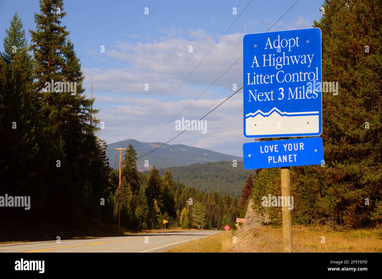 https://c8.alamy.com/comp/2F5YEFD/love-your-planet-adopt-a-highway-sign-along-the-yaak-river-road-yaak-valley-northwest-montana-photo-by-randy-beacham-2F5YEFD.jpg