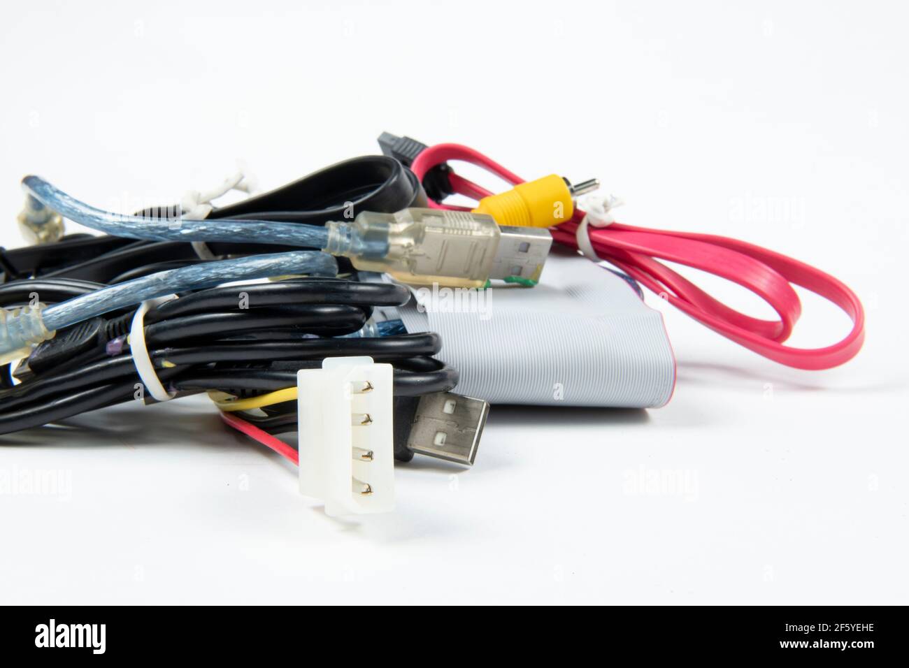 technological waste that remains in residence as computer cables Stock Photo