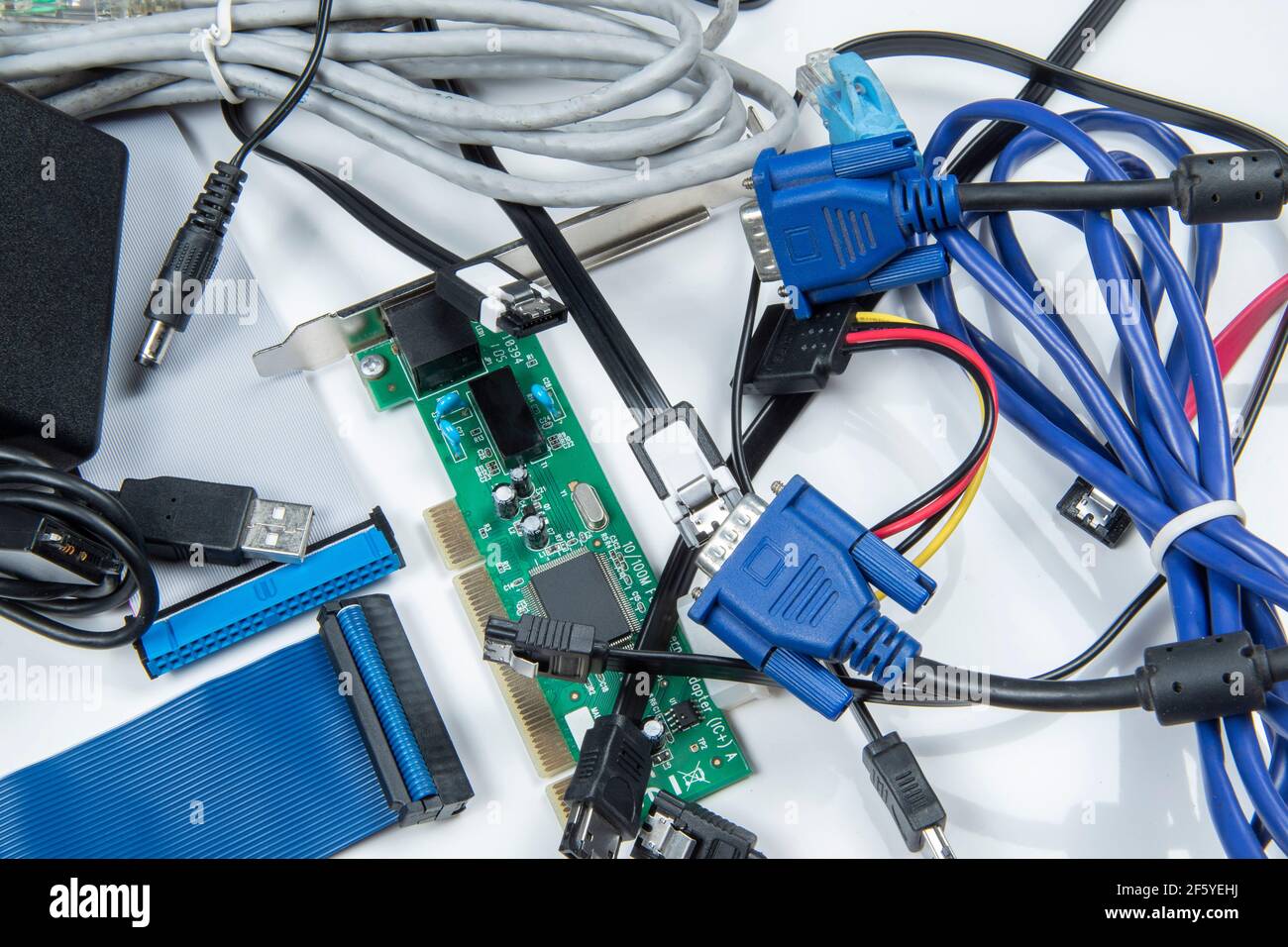 technological waste that remains in residence as computer cables Stock Photo