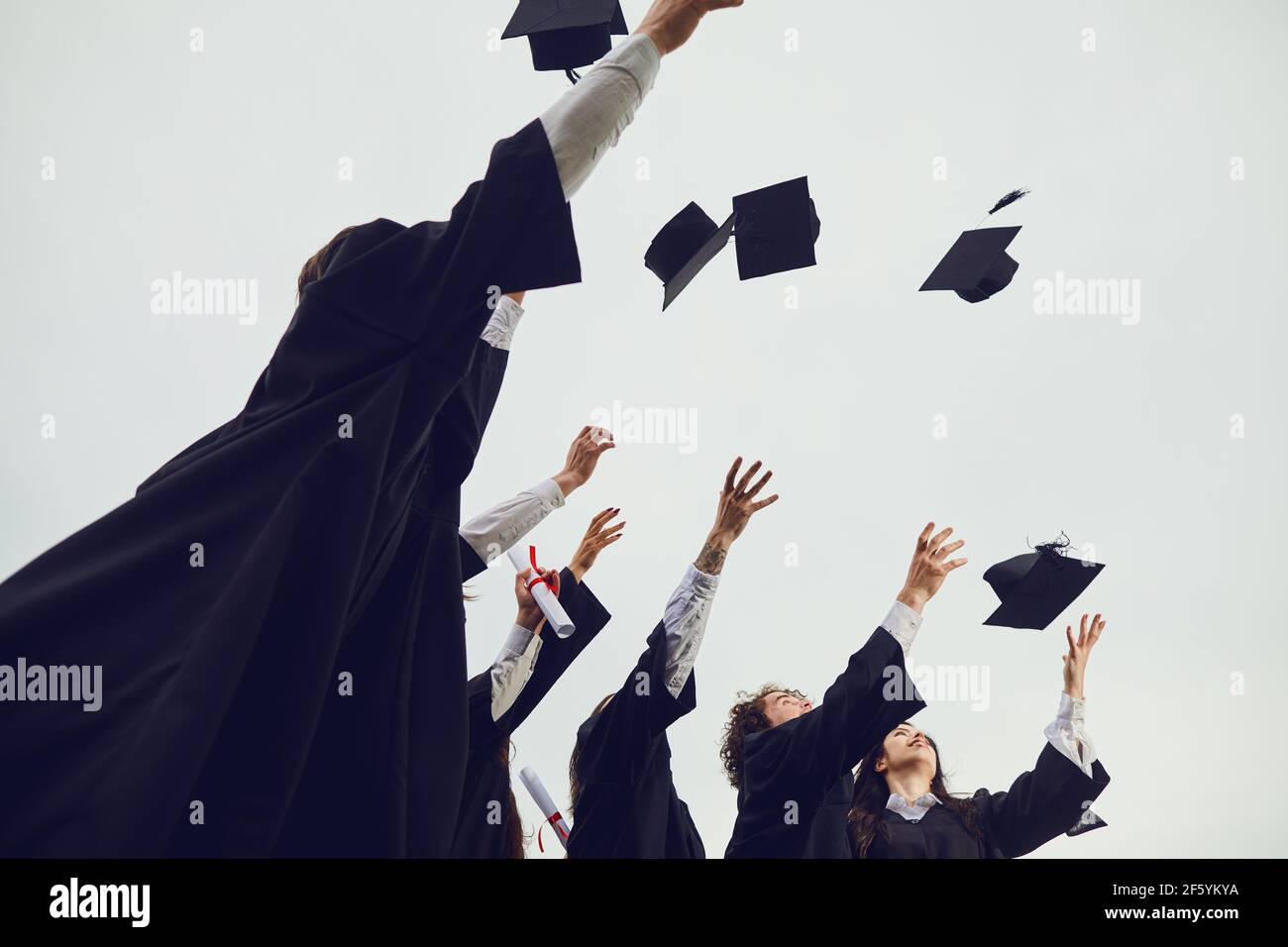 Graduation college throwing hat hires stock photography and images Alamy
