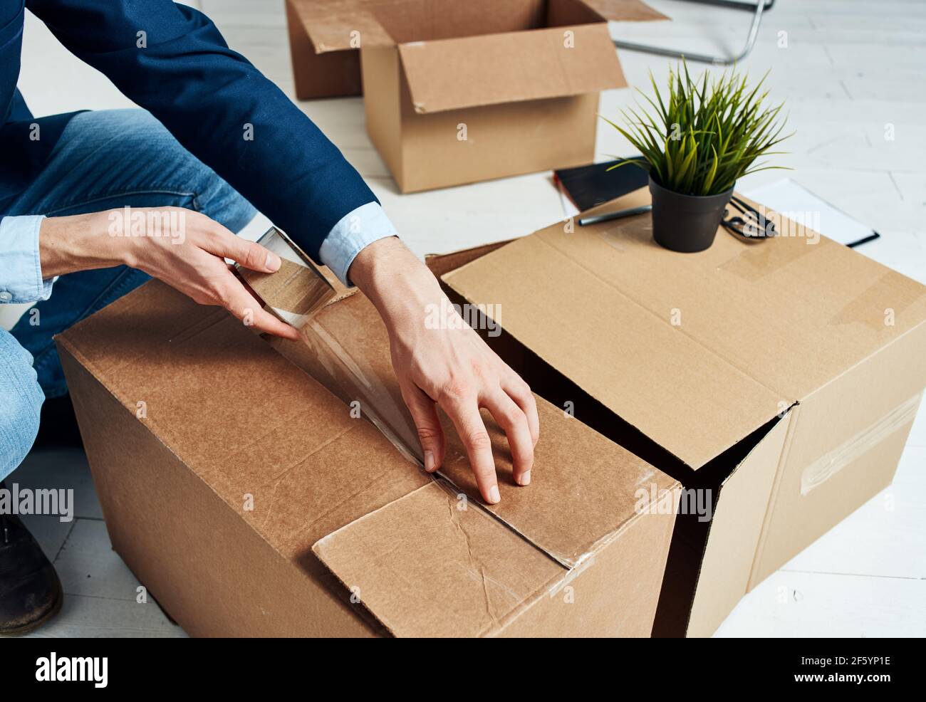 Packing boxes collecting things office work of a professional Stock ...